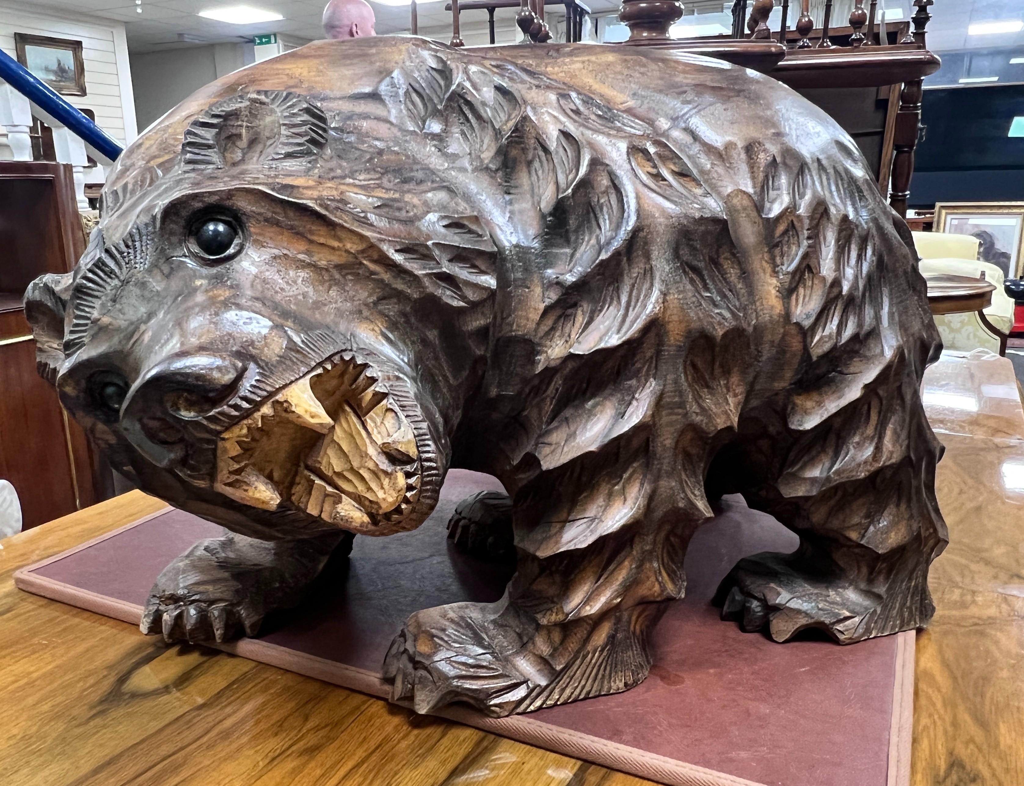 A large Japanese carved wood bear, 40 cms high